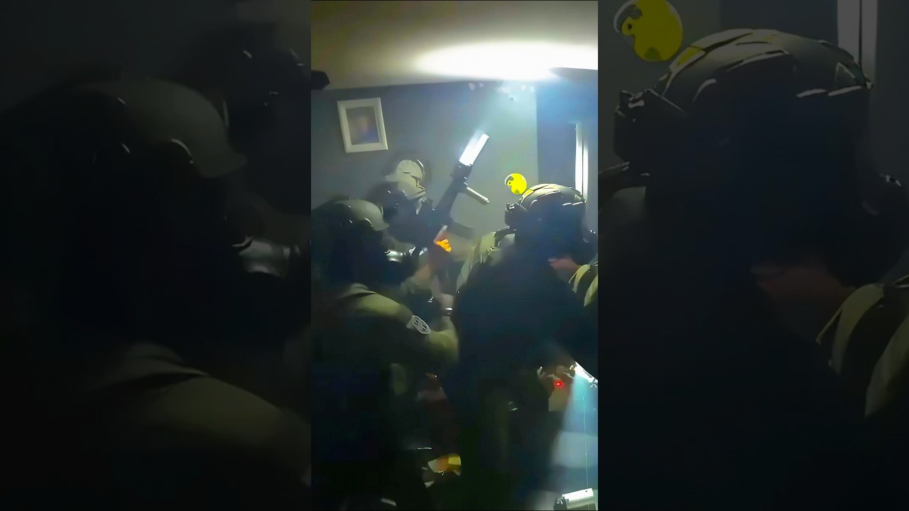 SWAT raids house as man throws knives at them