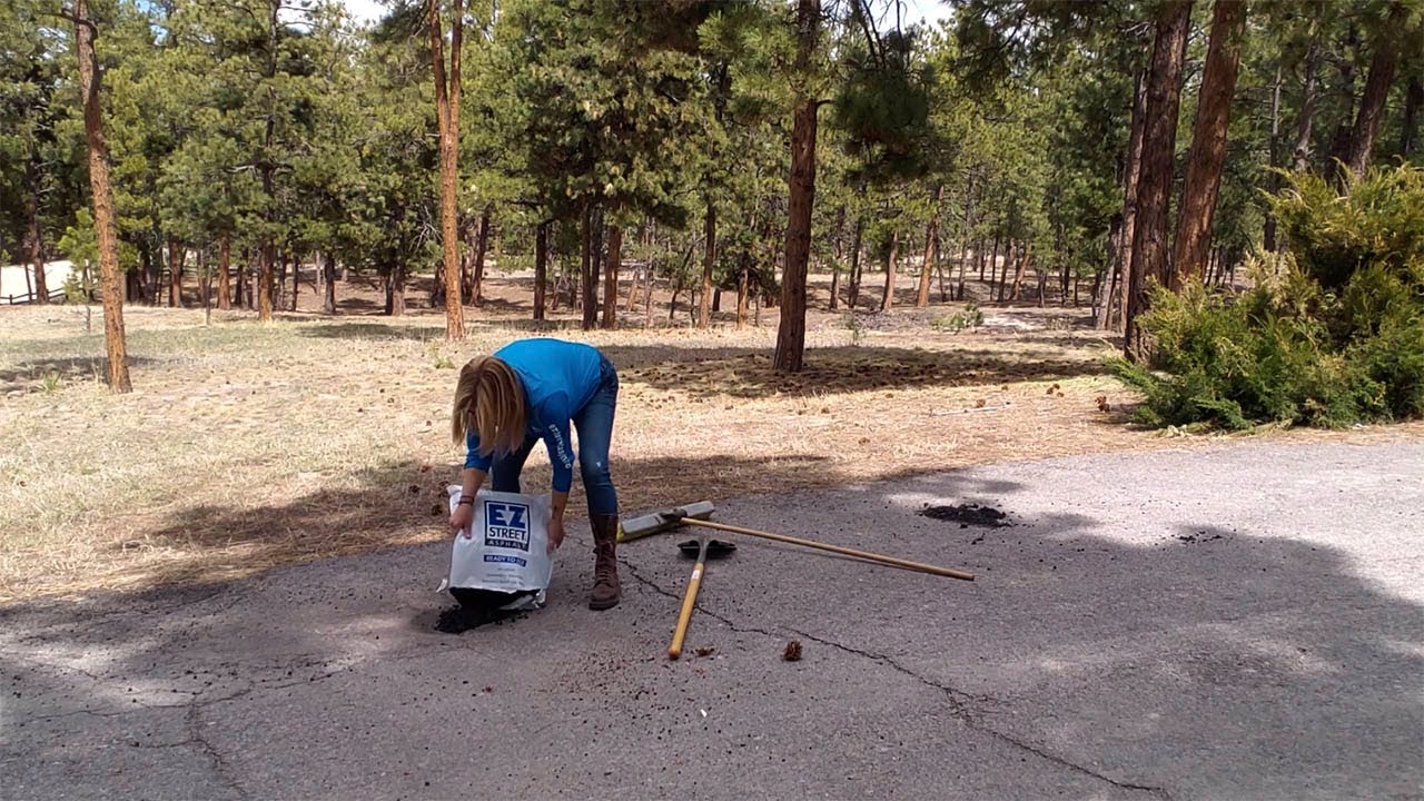 Patching a pothole with EZ Street asphalt couldn't be easier!