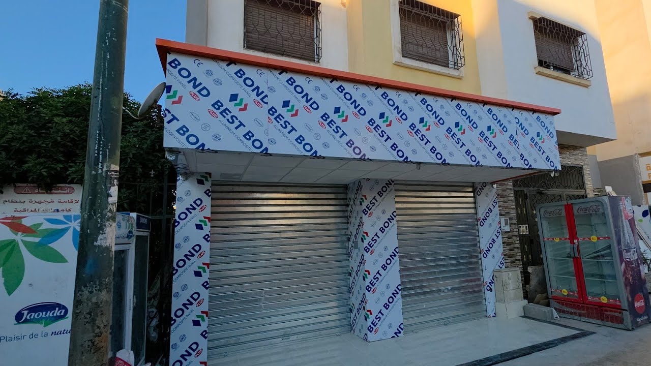 Habillage façade en alucobond  avec  faut plafond en platre 