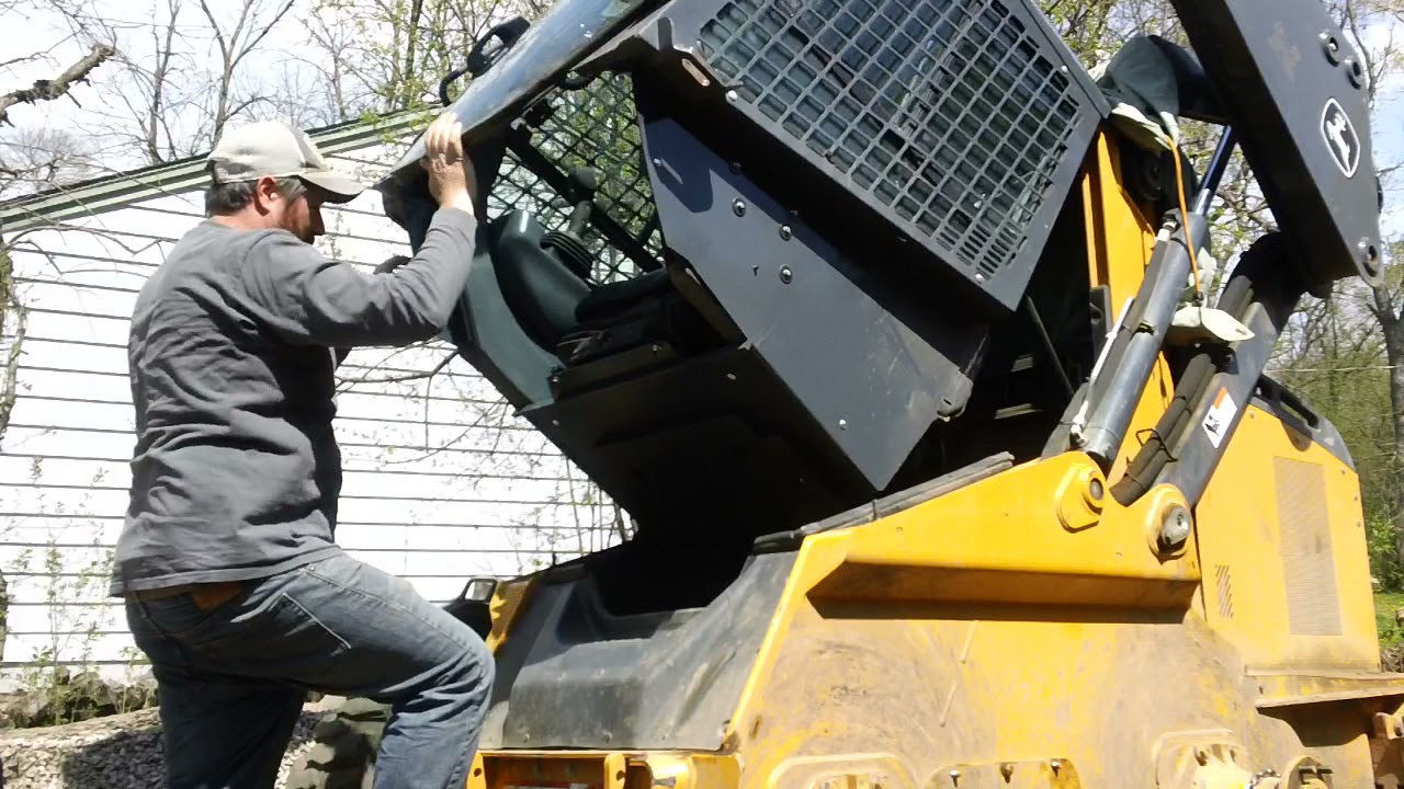 JD John Deere Skid Steer Raise Cab to access the engine.