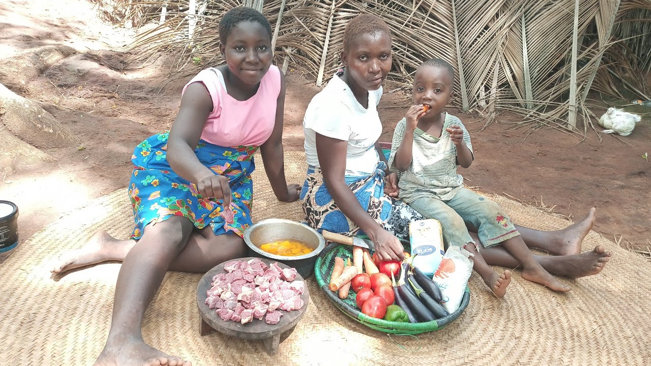 African Village life and Cooking yummiest pumpkin chapati served with eggplant, carrot stew