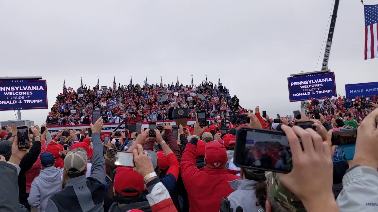 Trump enters rally to 