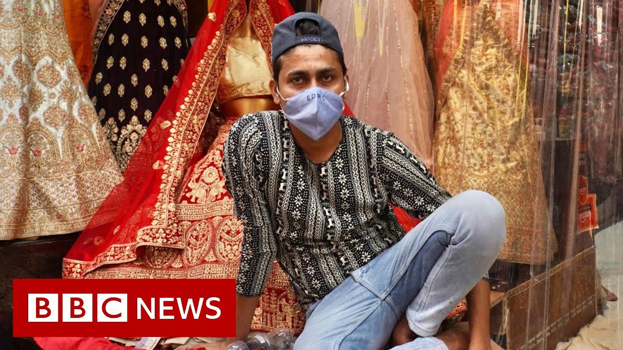 India Covid-19: Delhi's mask-averse shoppers worry officials