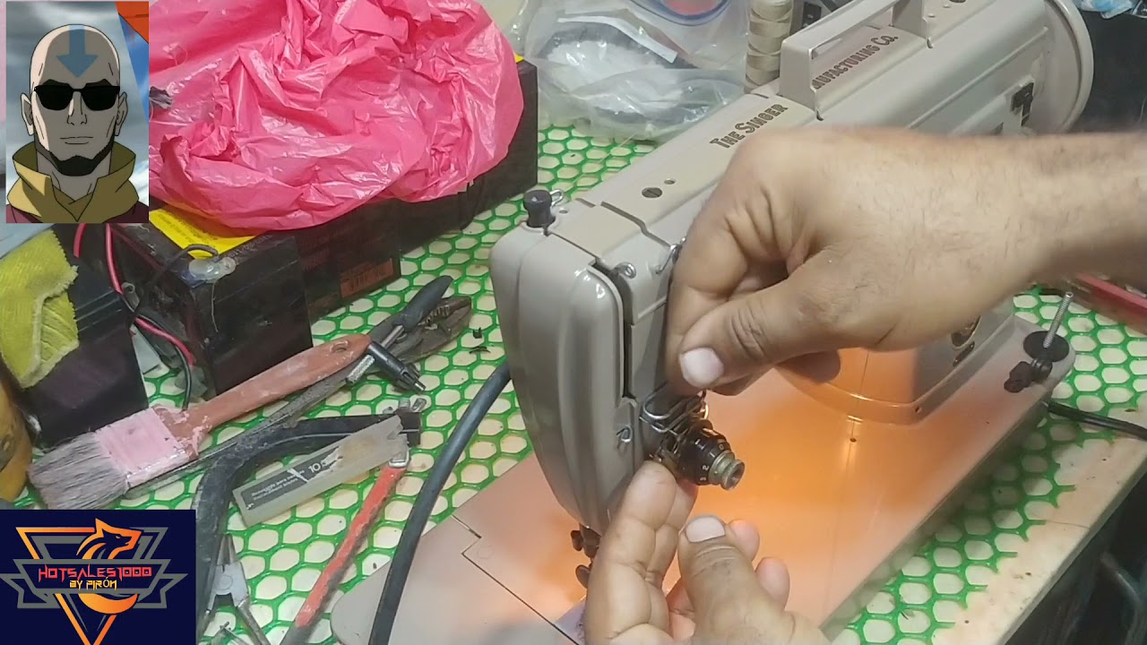 Hilado maquina de coser Singer 301.