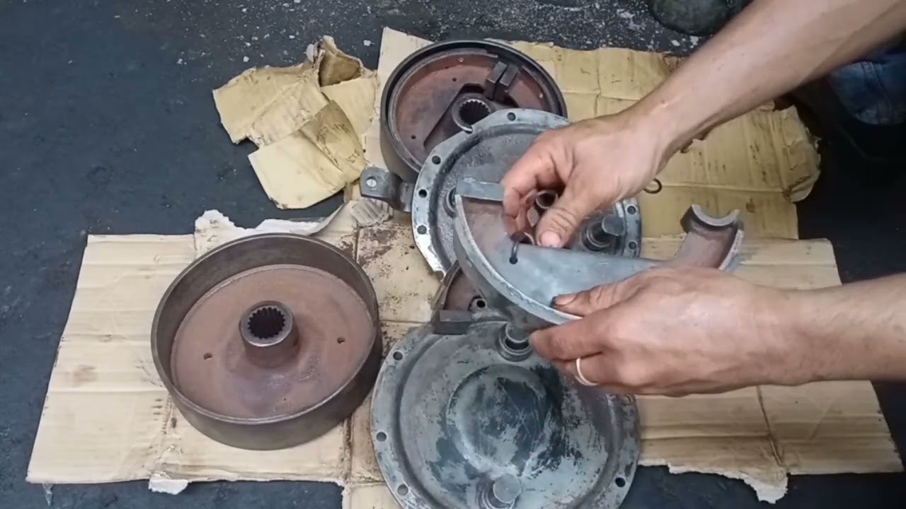 Remove brake drum and shoe for re-bonding Shibaura SD4000