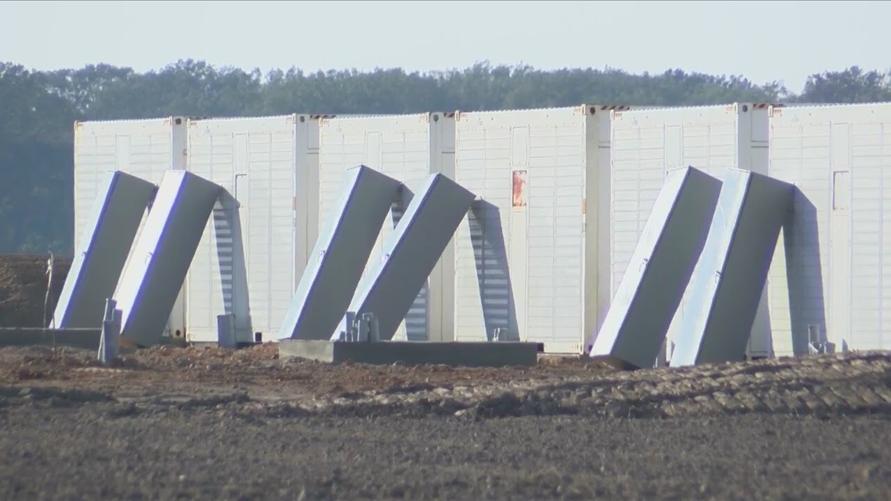 Community members in DeWitt gather to stop crypto mining site from going in