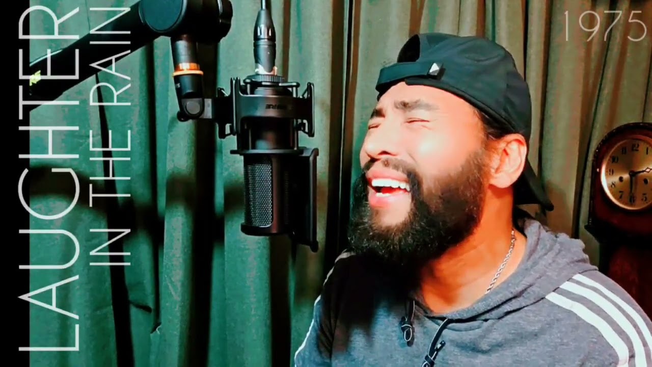 " LAUGHTER IN THE RAIN " - COVER