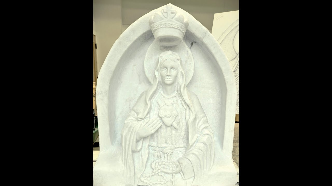 Blessed Mother carving in white marble
