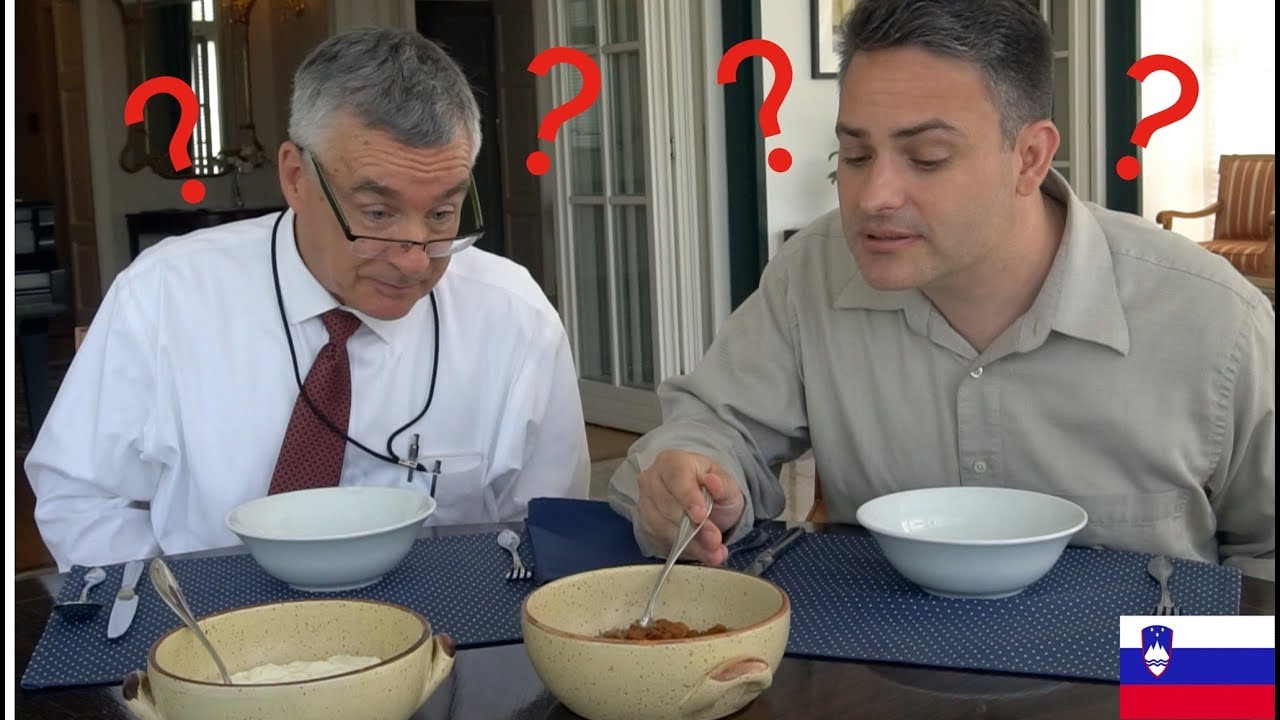 American Diplomats tasting Slovene traditional food