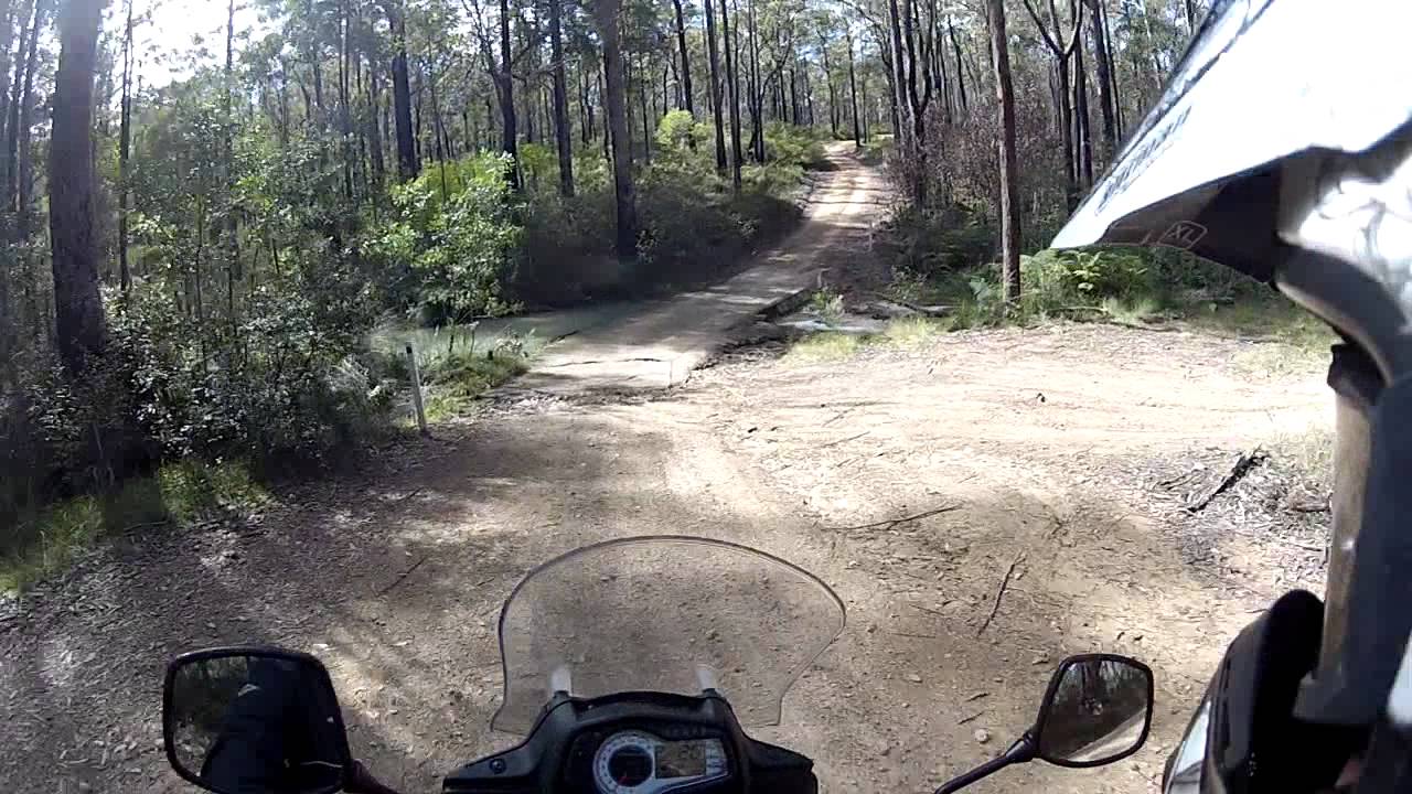 Testing 2012 DL650A Vstrom light offroad - uphill with jumps