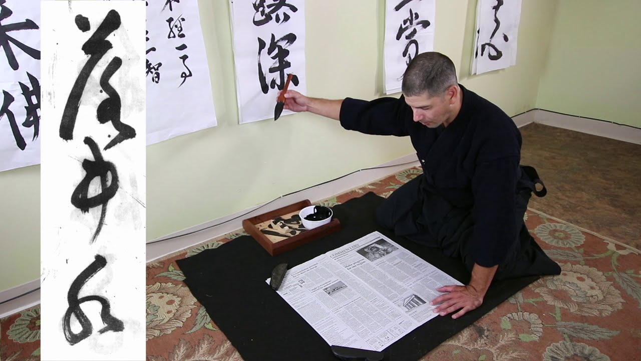 Practicing Zen calligraphy of Yamaoka Tesshu