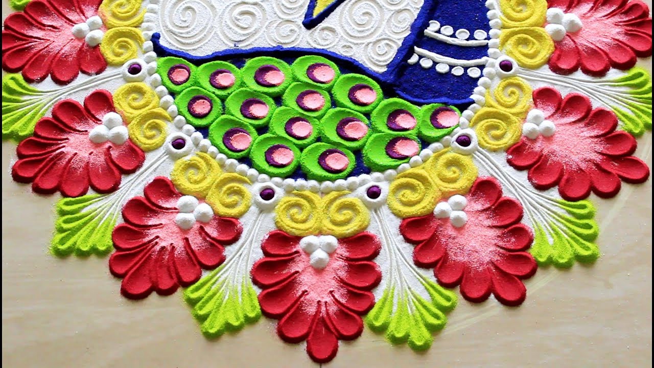 Beautiful peacock rangoli design with colours l mahalakshmi rangoli l gauri pujan rangoli l rangoli