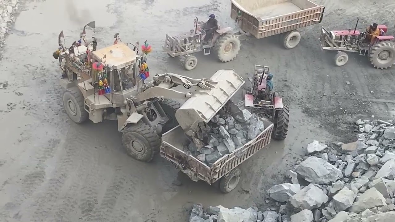 Giant Caterpillar Loading Massive Rocks Into Trucks! 😱Watch This Heavy Machine Move Huge Stones