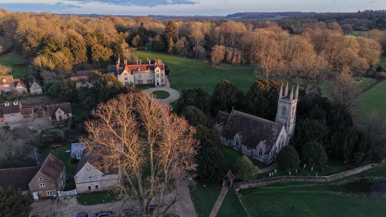 St Nicholas Church, Chawton, Hampshire.  DJI Mini pro 5 Drone flight.  Jane Austen Statue. 