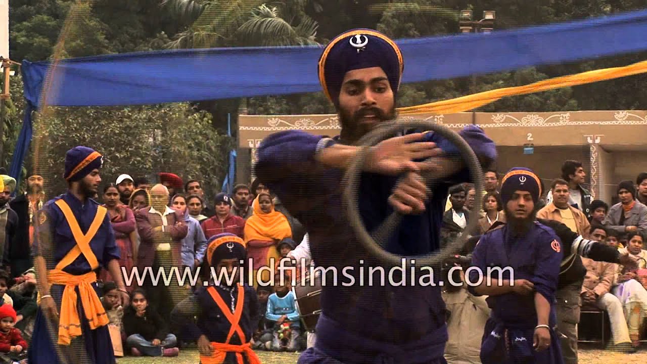 Nihang Sikh warriors display martial skills with weapons