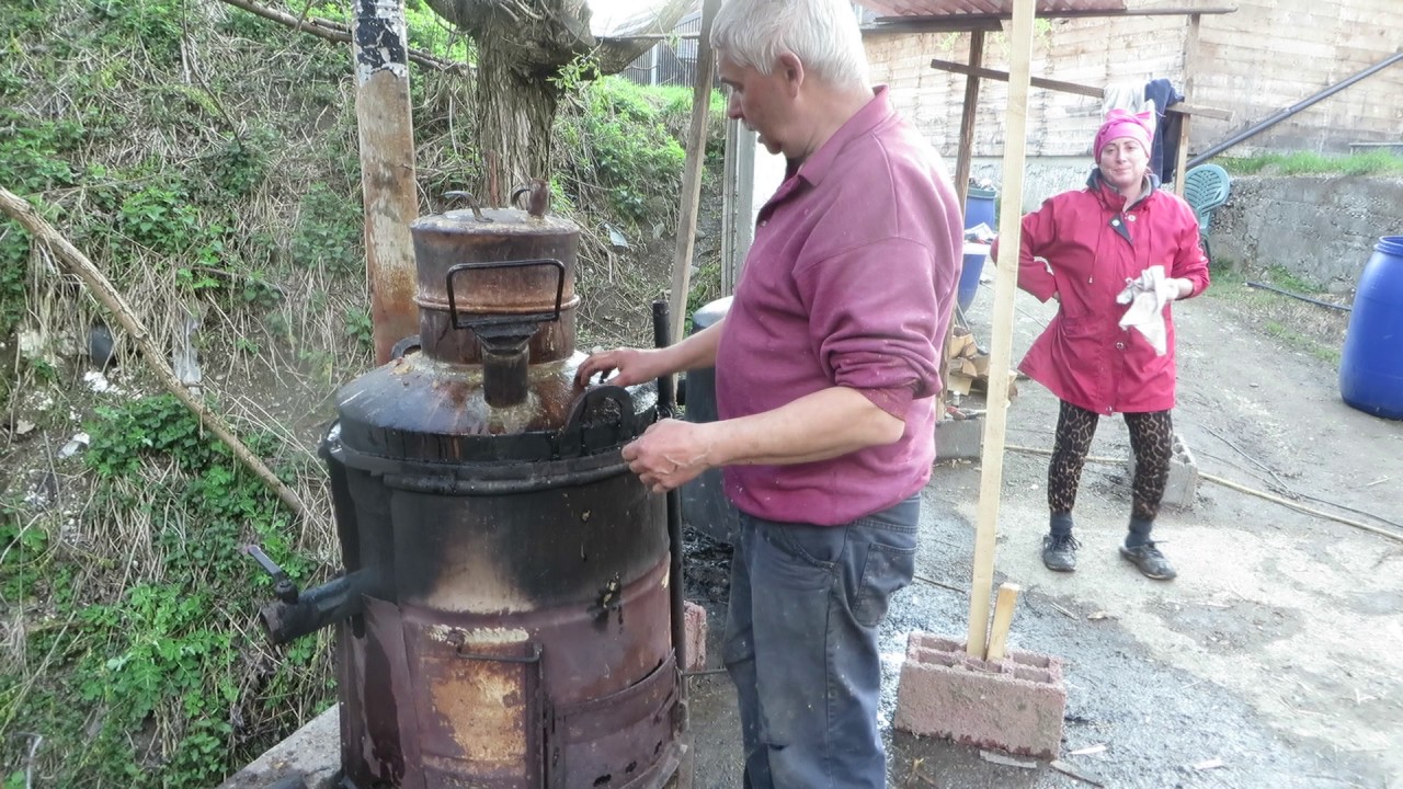 Making homemade Palinka:  Borsa,  Maramures, Romania Part 1 of 4
