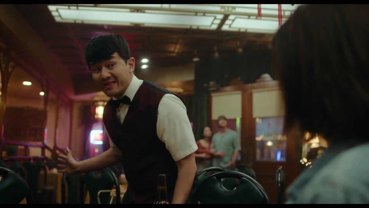 Ronnie Chieng (as Fatty Choi) as a waiter in Interior Chinatown.