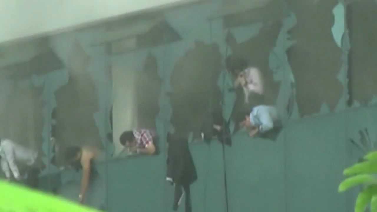Workers trapped in office fire building in Ecuador