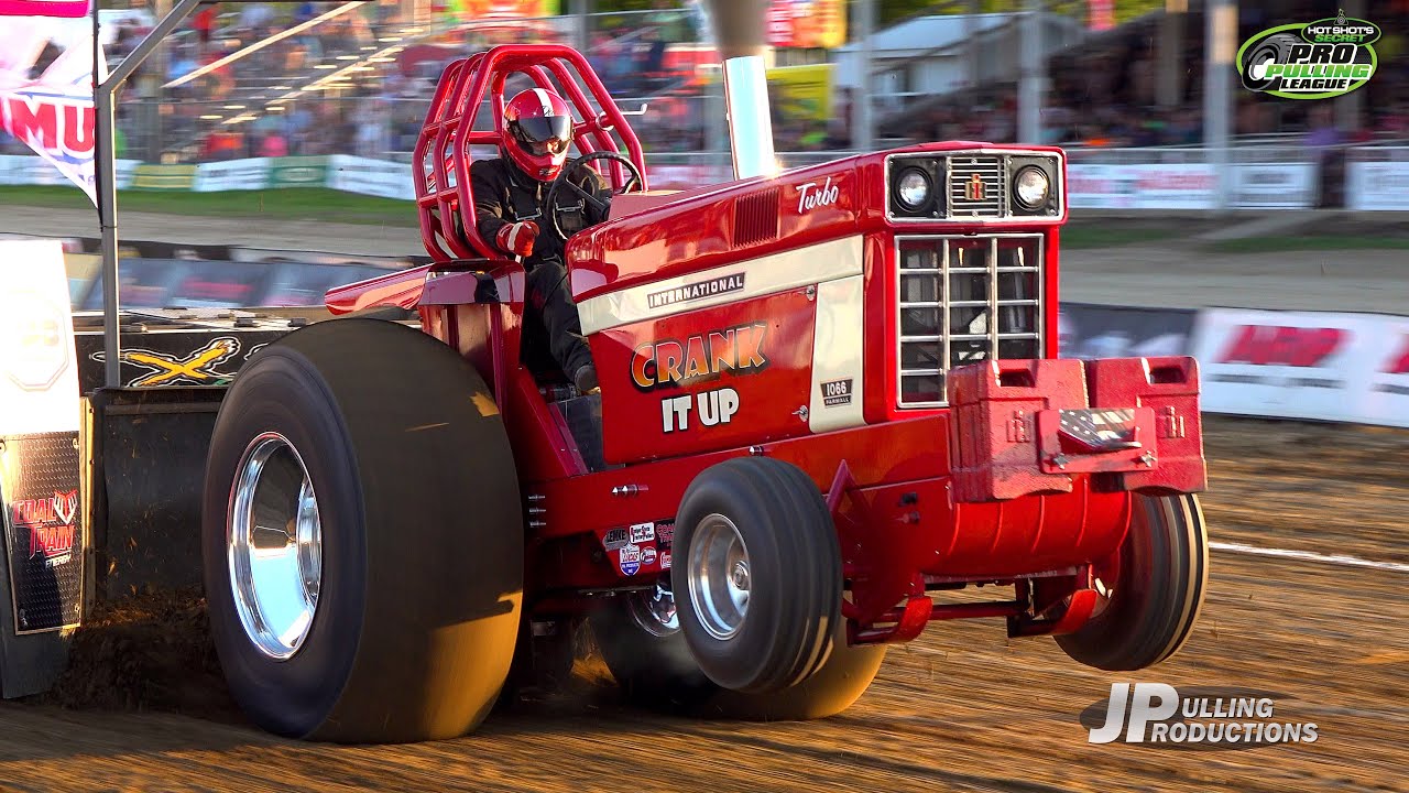 Tractor Pulling 2024: Super Farm Tractors pulling in Mt. Sterling, IL at the Brown County Fair