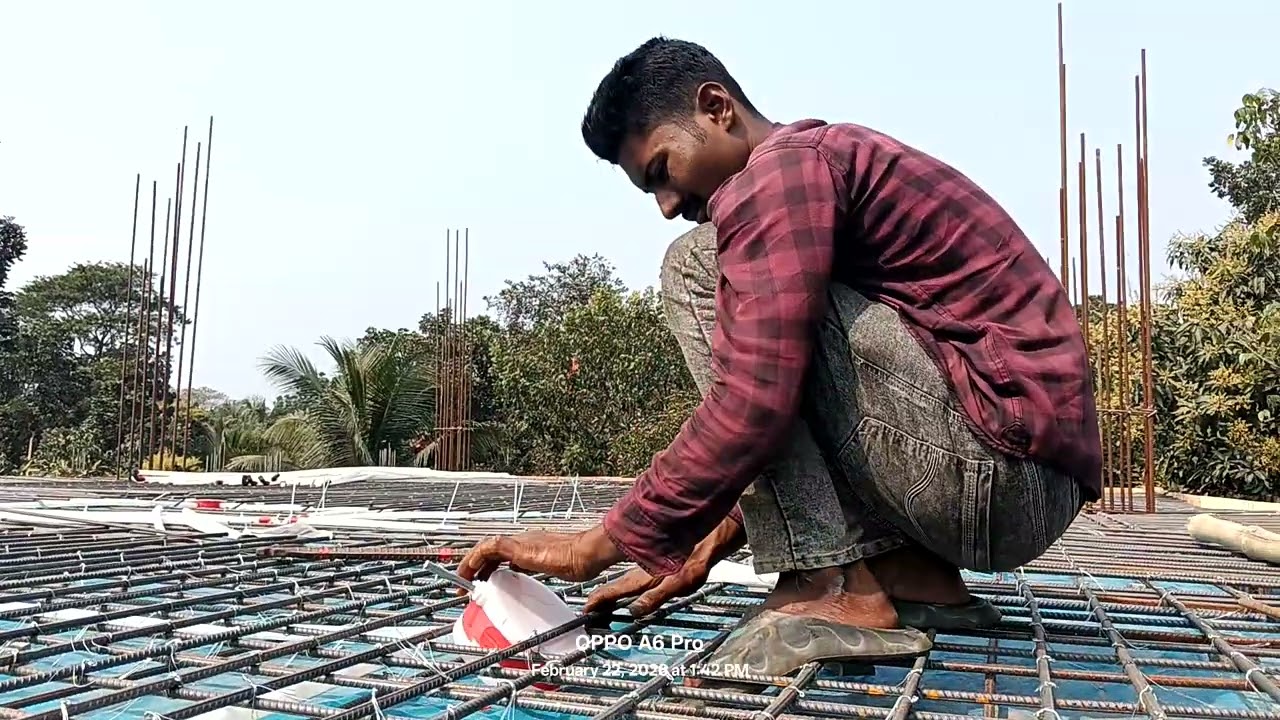 ছাদে রড বিছানোর পর ইলেকট্রিক পাইপ এবং ফ্যানের রিং সেটিং।#