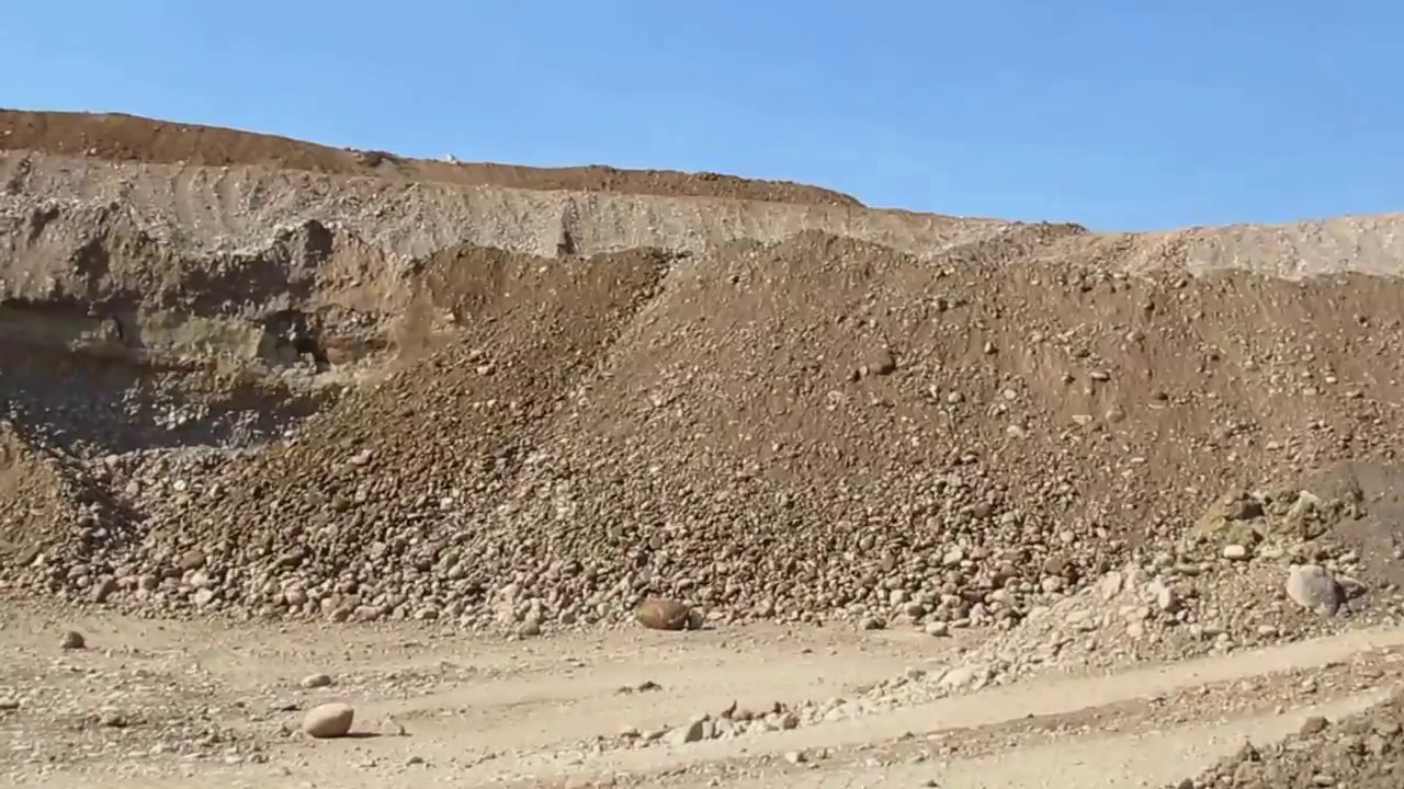 Dozer works a bench at Four Corners Materials