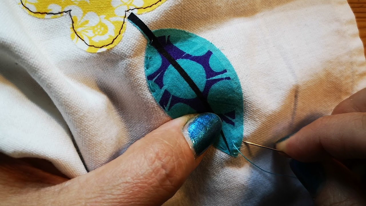 Applikationen mit der Hand aufnähen