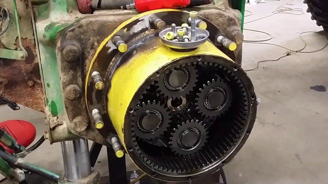 4930 hub tear down. Ag mechanic at work