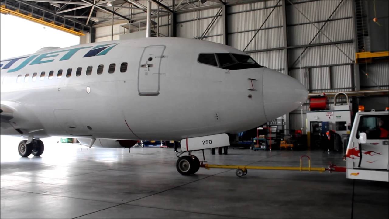 *SPECIAL* -- WestJet Boeing 737-700 getting towed into hangar (Calgary 05/14/2016)(HD)