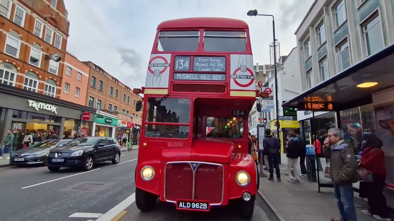 Modern and old buses together on London Streets