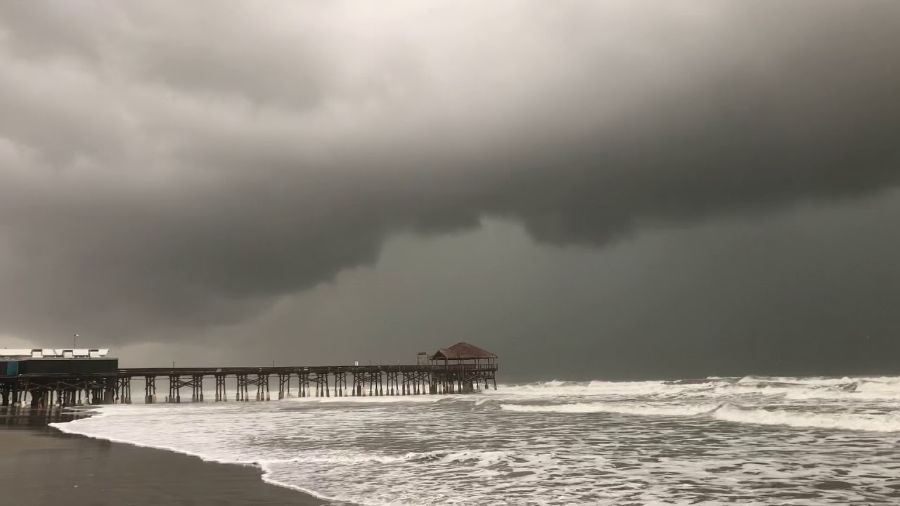 INTENSE SQUALL, developing water spout over Cocoa Beach Pier, FL!