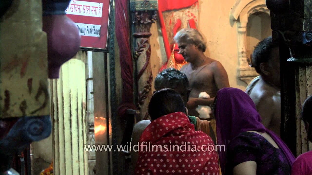Hindu priest performing the Aarti rituals in Varanasi