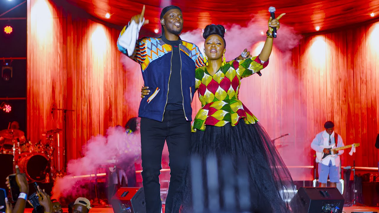 Pompi and wife Esther chungu performing together live in uganda at alive in the park concert