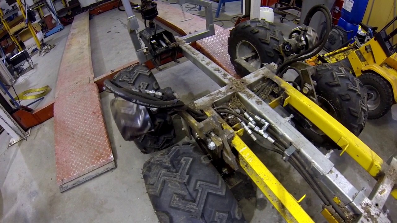 ATV trailer hydrostatic drive line  hose routing improvement