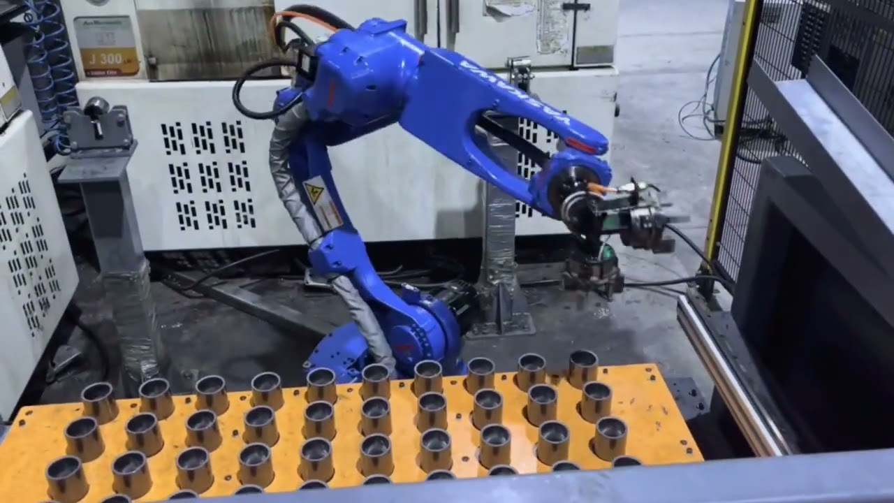 Input - output pallet stacker for robotic CNC machine tending application
