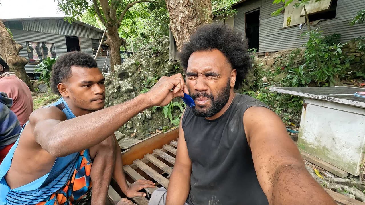Getting a trim by the village barber🇫🇯💇🏾‍♂️