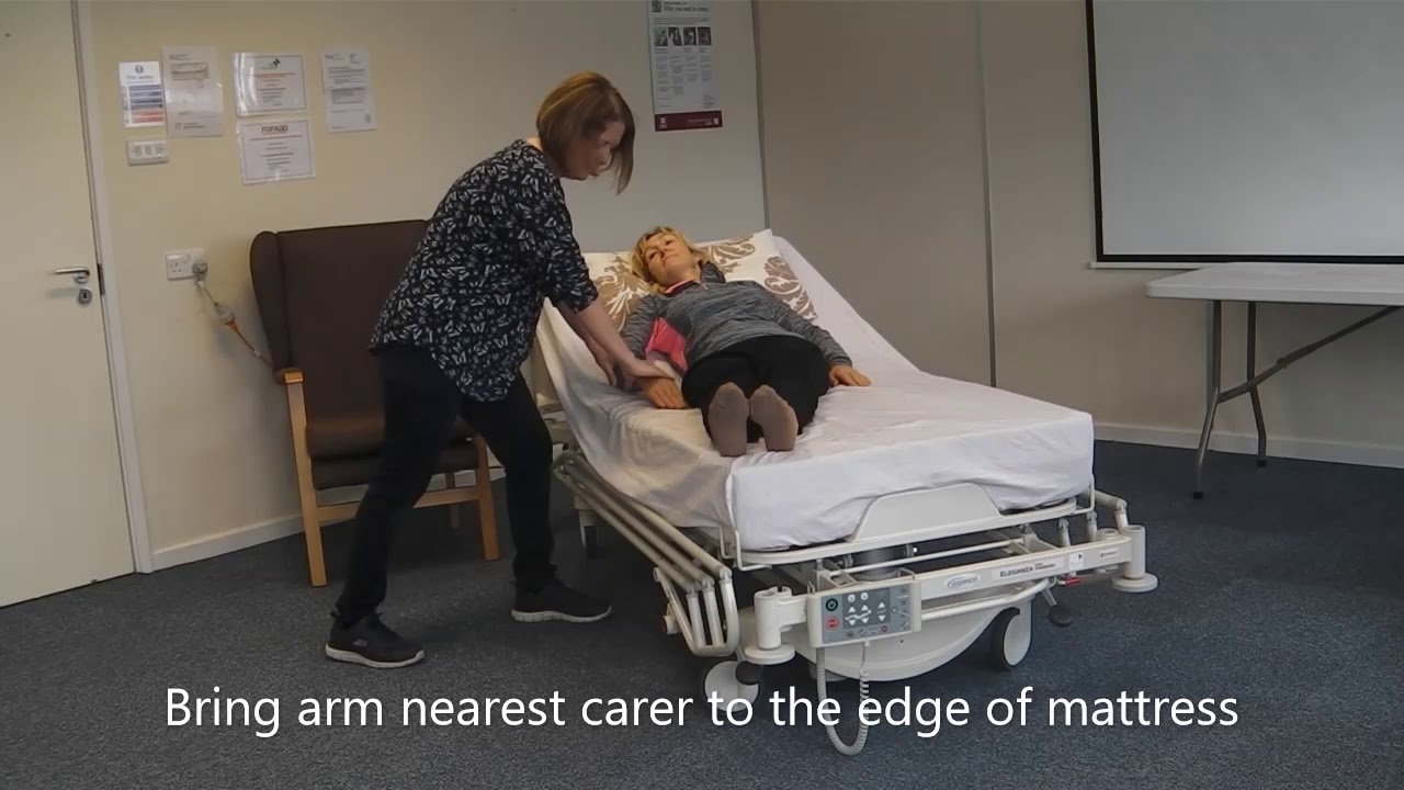Assist a person to sit up in bed from lying flat