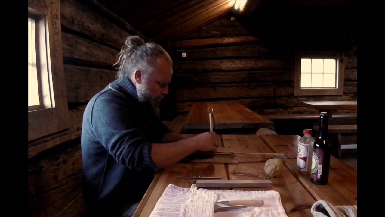 Thor Holvila carves a rectangular mame pot out of one block of clay