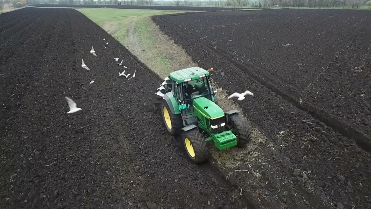 JOHN DEERE 7810 & Kuhn multimaster 151 (4x50) Oranje 2022