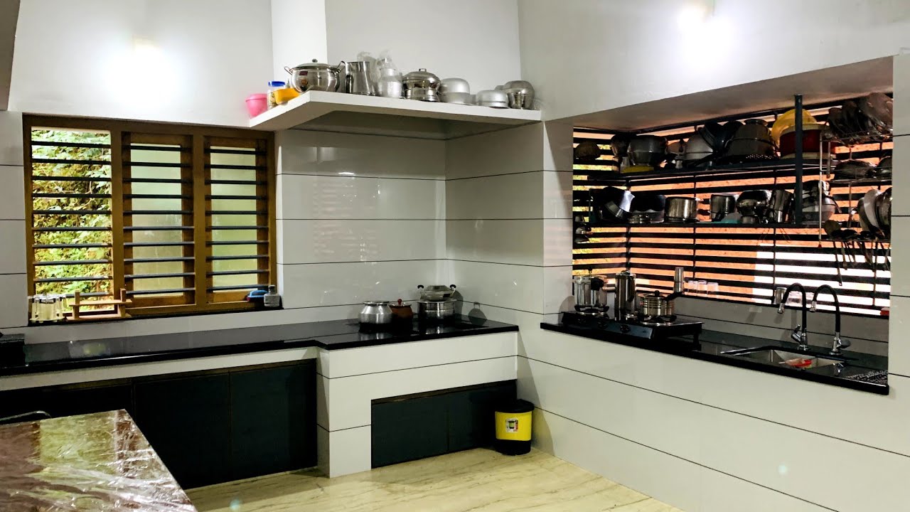 kitchen tour | പുതിയ വീട്‌ പണിയുന്നവർ ഈ അടുക്കള കാണാതെ പോവരുത് വിറകടുപ്പോട് കൂടിയ വിശാലമായ അടുക്കള 👌