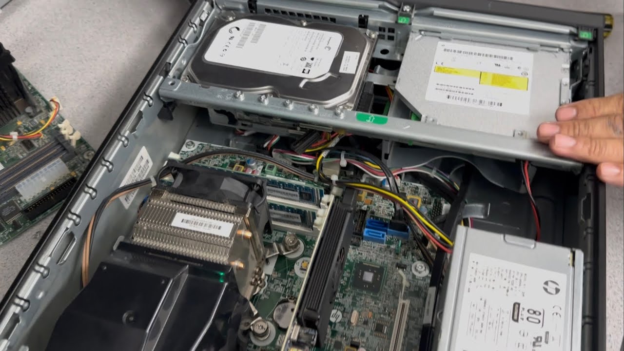 Inspecting the inside of a HP desktop computer with Sajjad