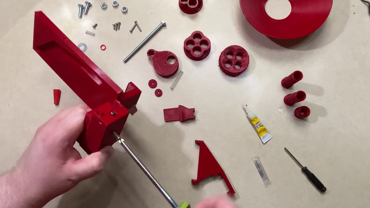 3D printed Hornady case feeder assembly.