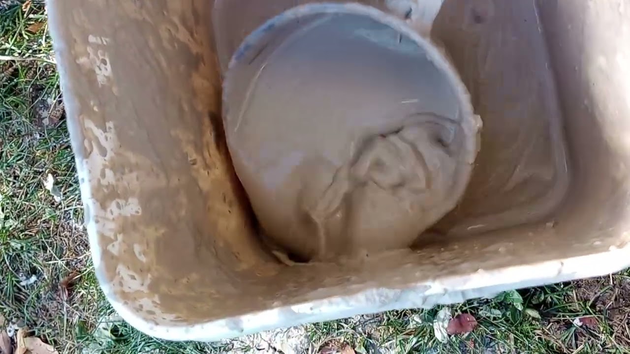 Processing raw clay - soaking it, thinning it, straining it.