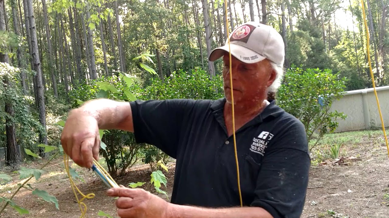 Felling a tree using a rope even if it leans the wrong way