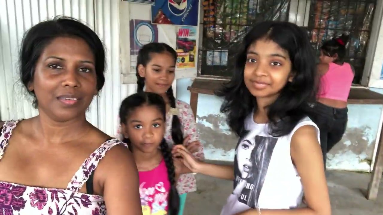 Kids going to the shop in Guyana/eating fruits and delicious food