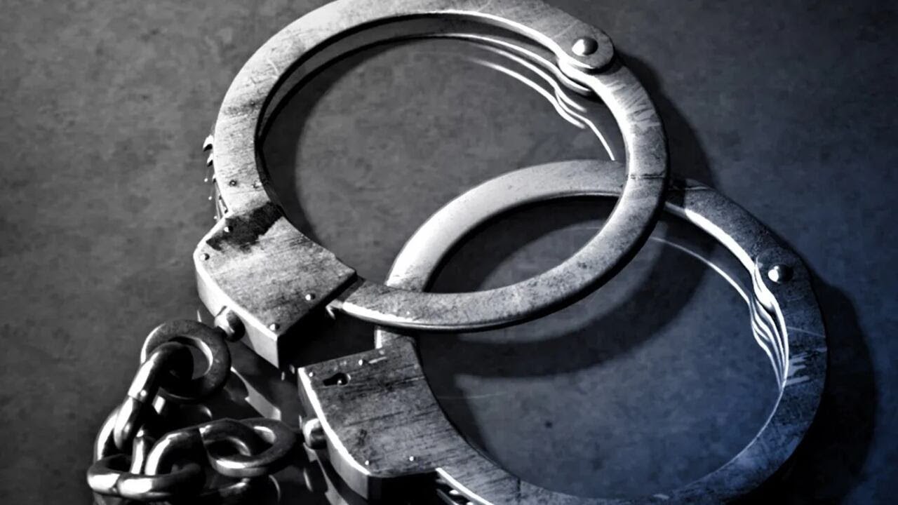 Woman accused of burning child with curling iron in Evans