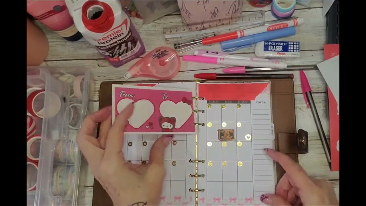 February in my Louis Vuitton agenda, using stickers from our Valentine's Day card exchange!