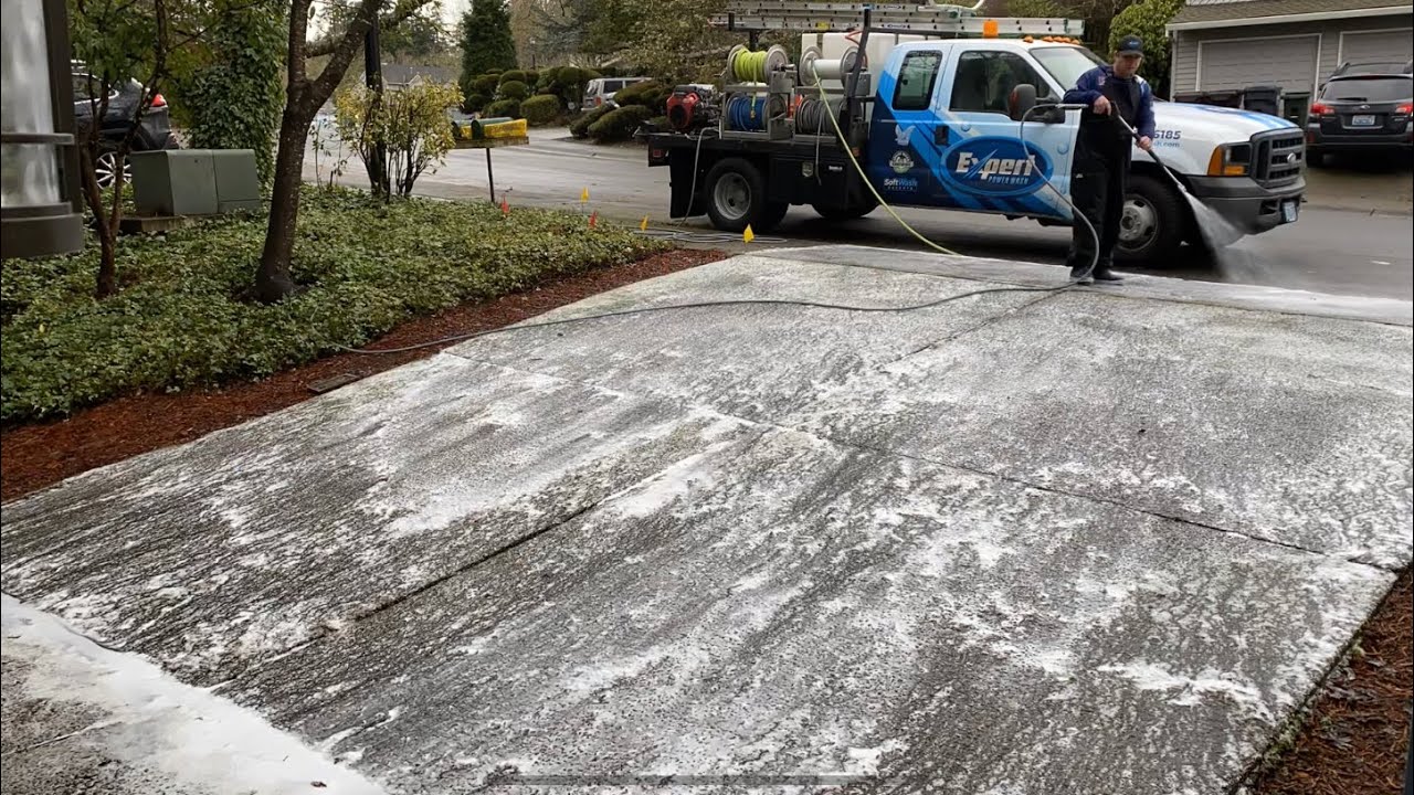 Pressure washing an aggregate driveway walk around and time lapse