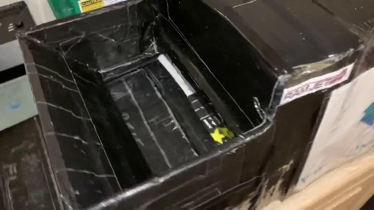Scale model self-contained compactor unloading