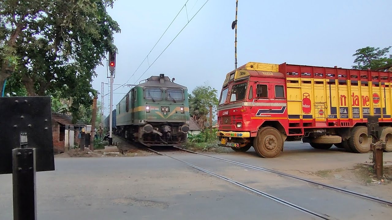 Dangerous Scene : Truck In Front Of The Train, Long Time Gate Open At slum Side Single Line Railgate