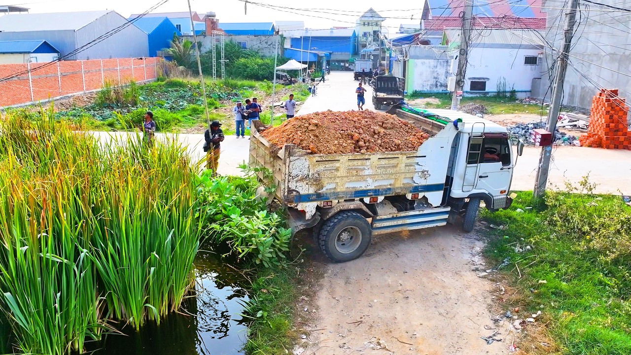 incredible landfill best work build house , truck transport soil , bulldozer push soil . MIX VDO